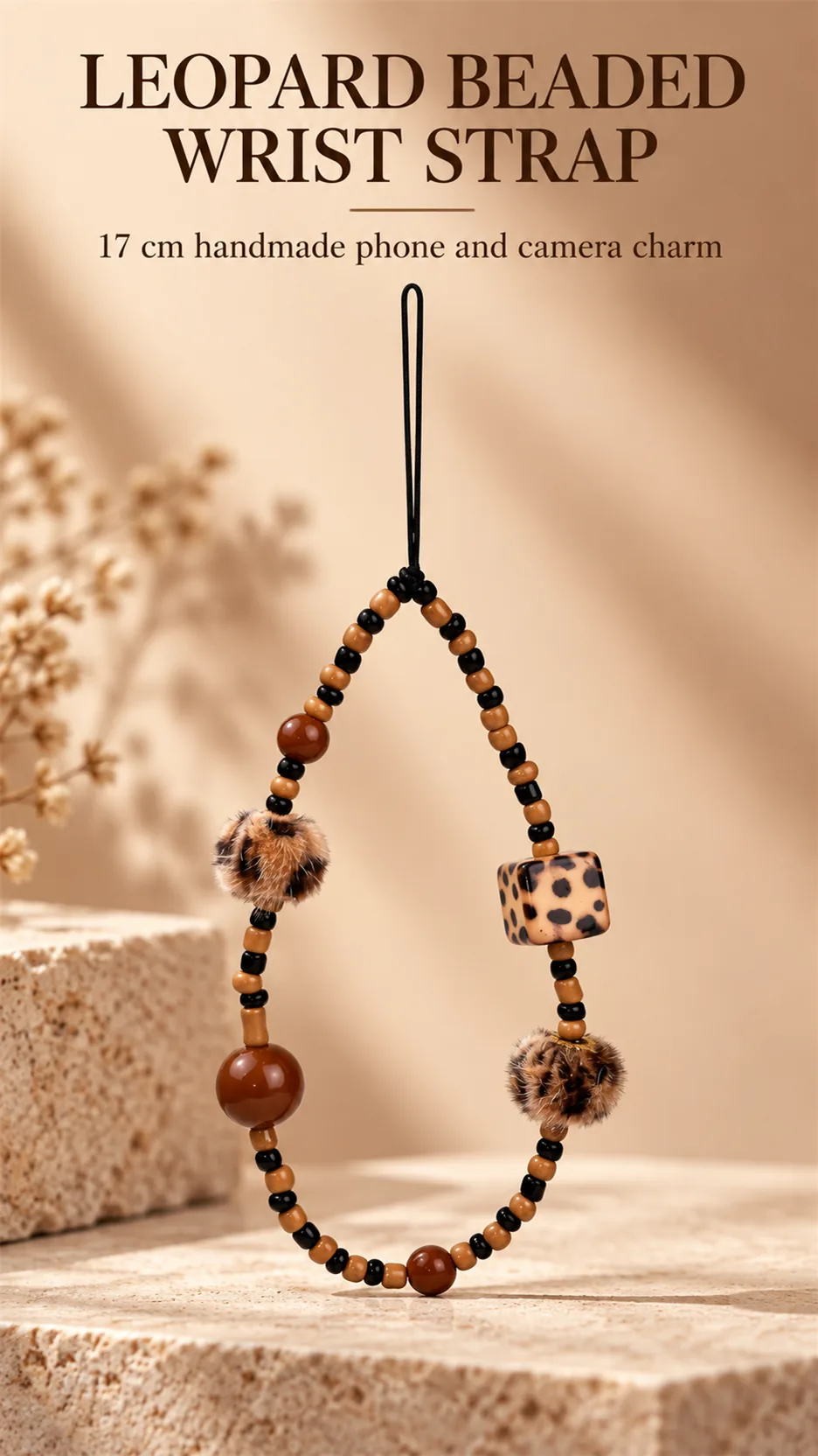 The phone hangs on a merad-like, brown, retweeted, chained cell phone chain with a camera. product detail 1