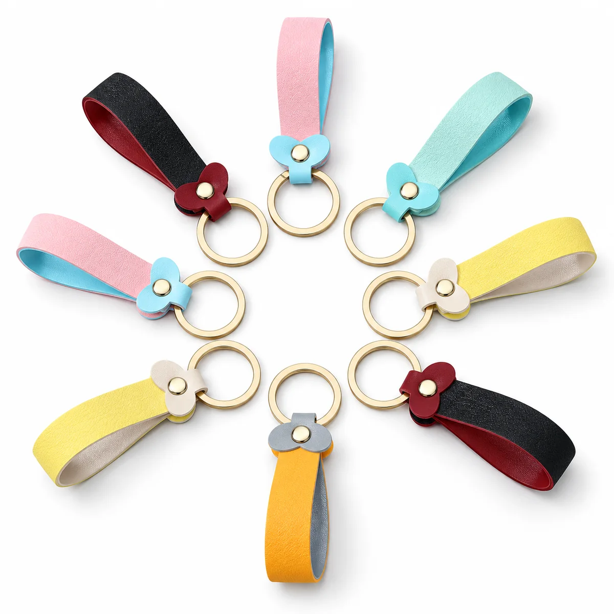 Heart-shaped leather keys to a couple's key-chain bag with a stylish car key button.